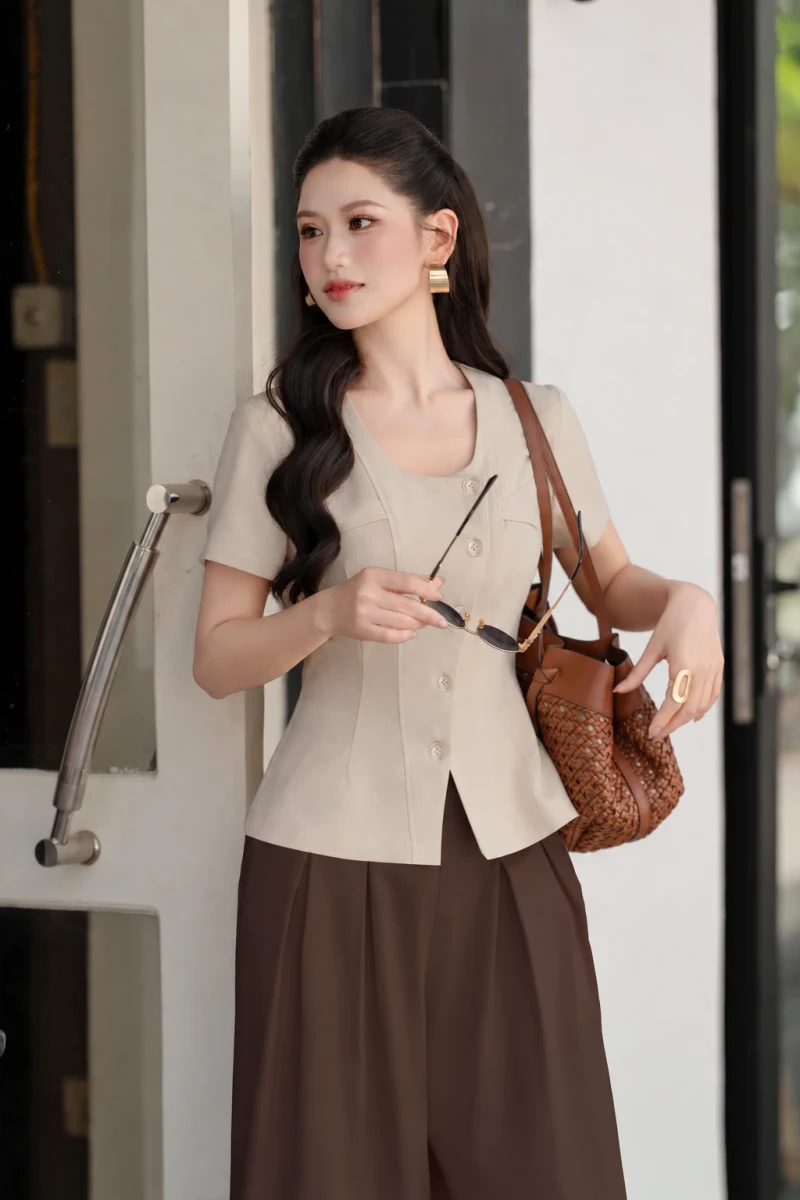 Áo kí giả cổ tròn